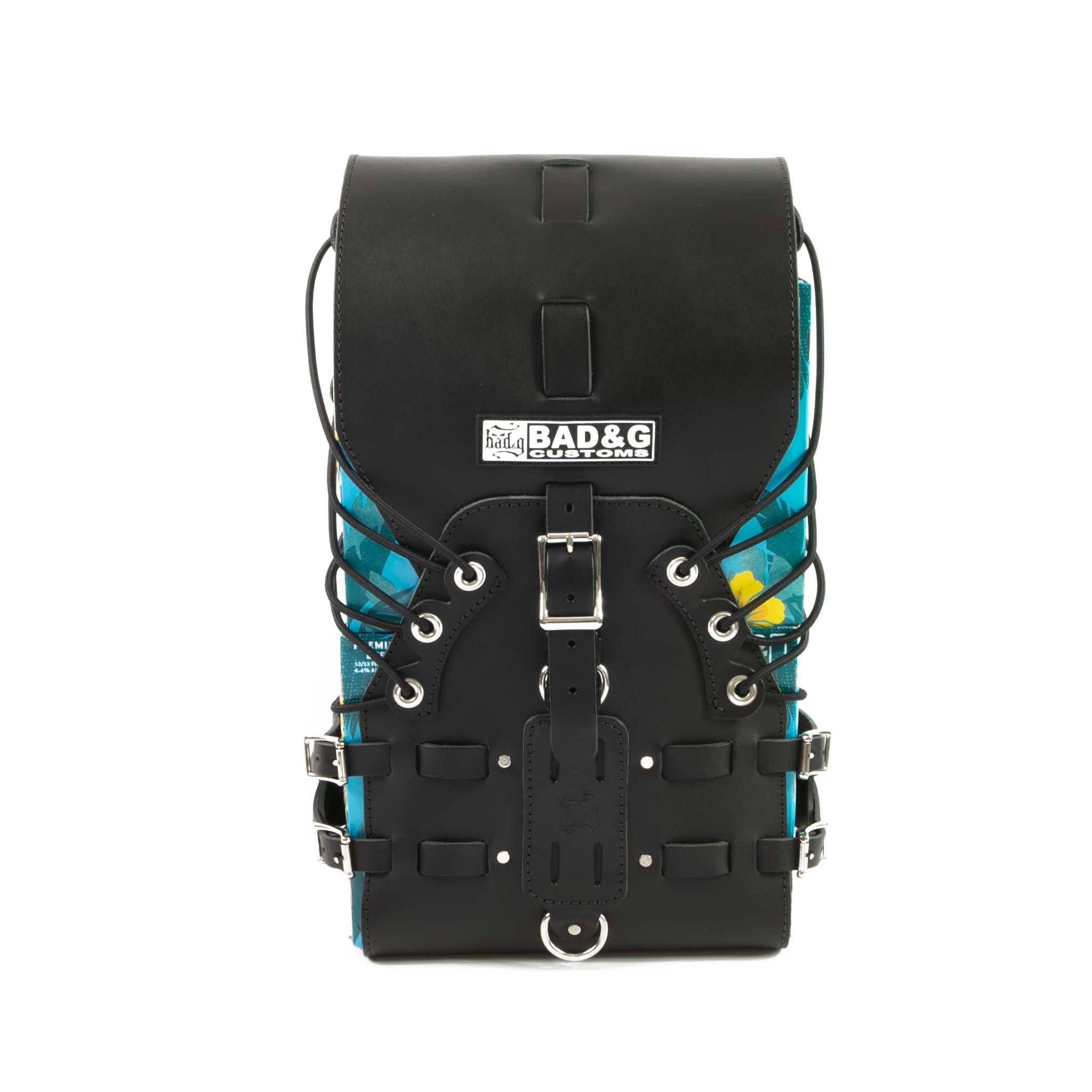 Front utility panel and D-rings for tool roll, flashlight or tripod attachment