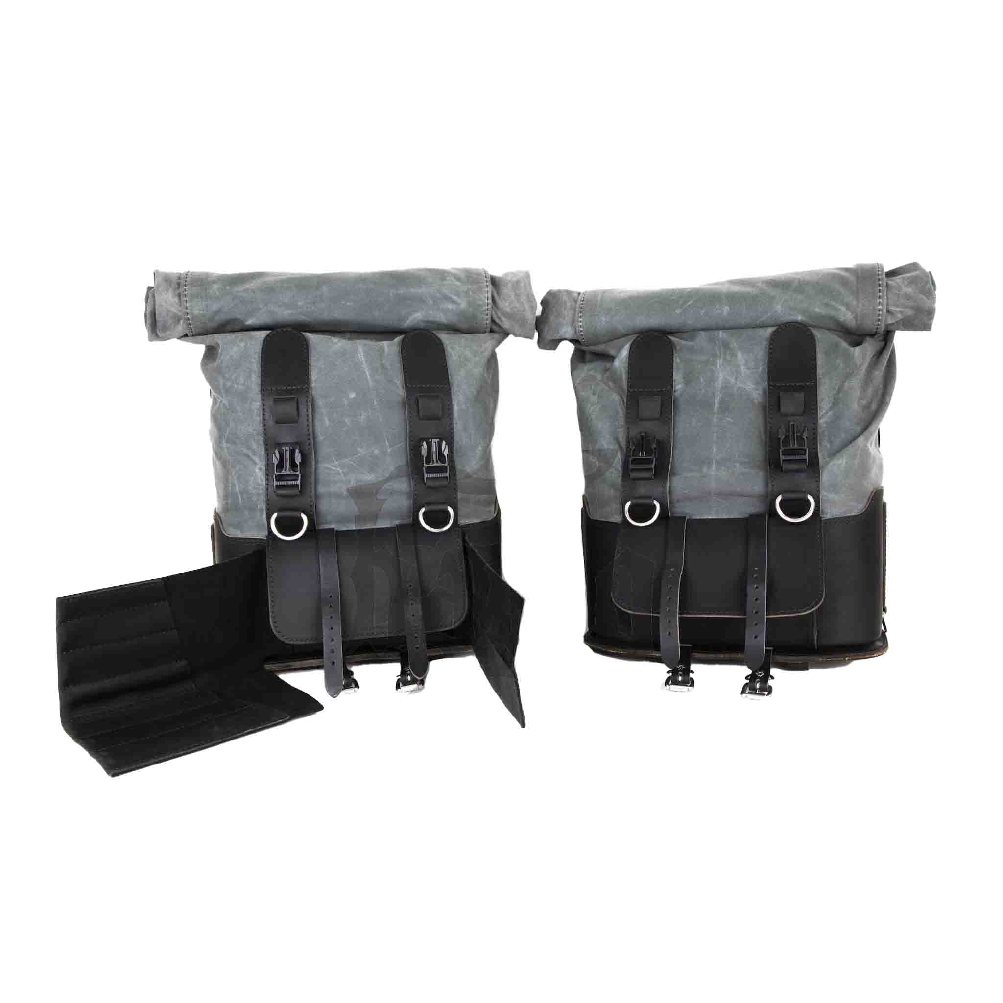 Upgrade your ride with the URB10 Rolltop Saddlebags. Unique design enables quick conversion from saddlebag to backpack. Hand crafted in USA with premium veg tan water buffalo leather, waxed canvas and stainless steel hardware. Durable and stylish, they are the perfect fit for your motorcycle.