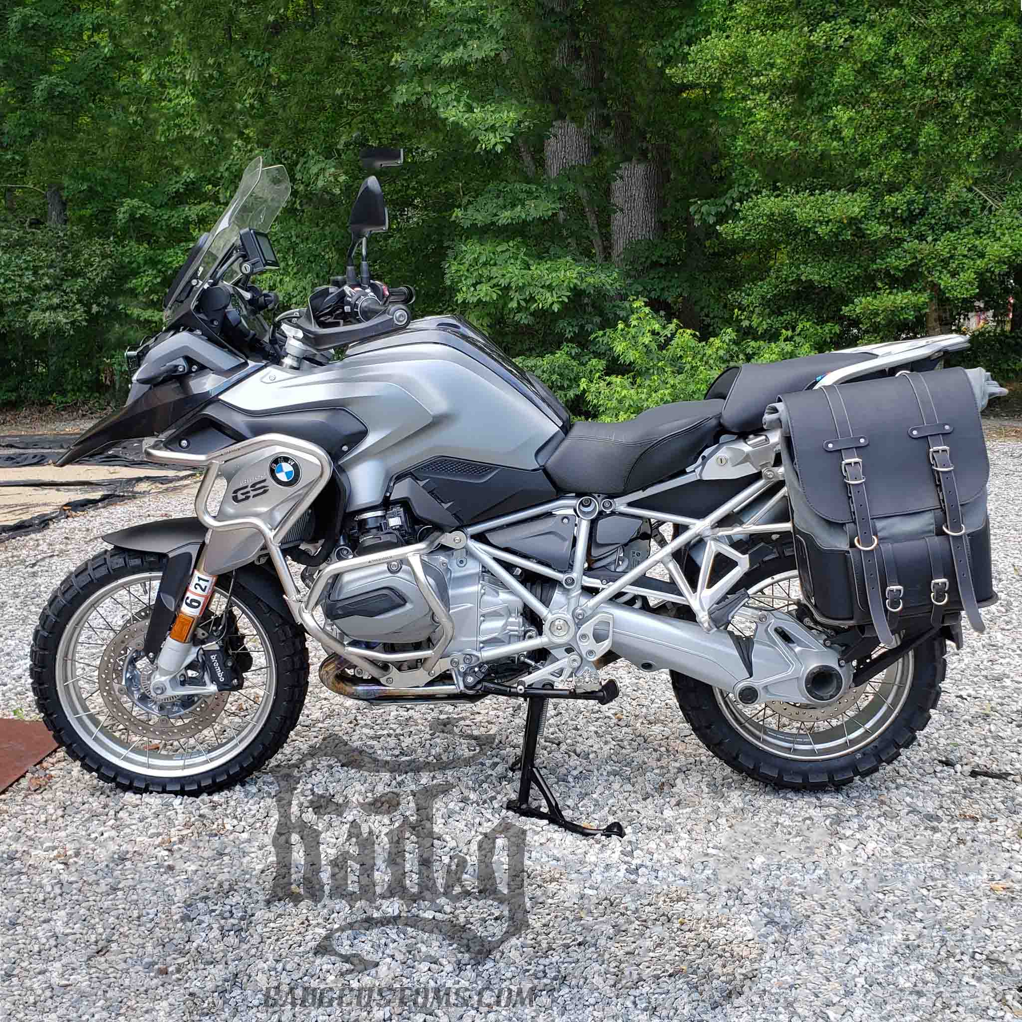 Upgrade your ride with the URB10 Rolltop Saddlebags. Unique design enables quick conversion from saddlebag to backpack. Hand crafted in USA with premium veg tan water buffalo leather, waxed canvas and stainless steel hardware. Durable and stylish, they are the perfect fit for your motorcycle.