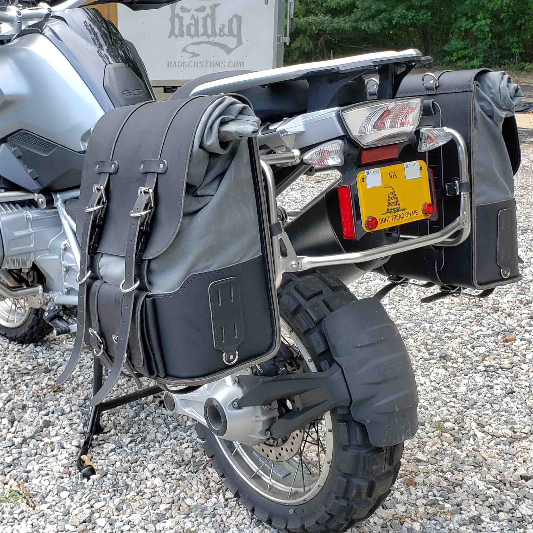 Upgrade your ride with the URB10 Rolltop Saddlebags. Unique design enables quick conversion from saddlebag to backpack. Hand crafted in USA with premium veg tan water buffalo leather, waxed canvas and stainless steel hardware. Durable and stylish, they are the perfect fit for your motorcycle.