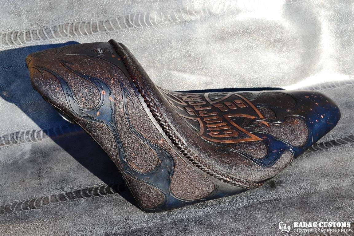 "Big Dog Choppers" logo design hand tooled and braided. Antiqued Blue Veg tan leather with kangaroo lace. West Coast Choppers for Life!